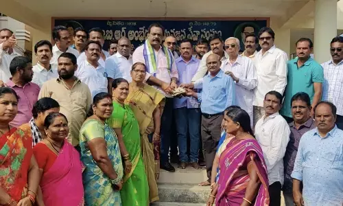 YSRCP Visakha West coordinator Adari Anand Kumar contributes to Ambedkar Statue