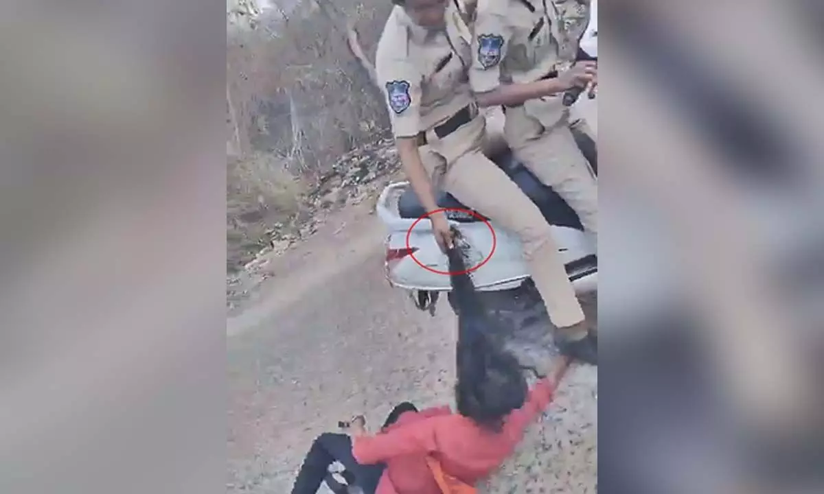 NHRC notice to Telangana over woman cop dragging girl student by hair