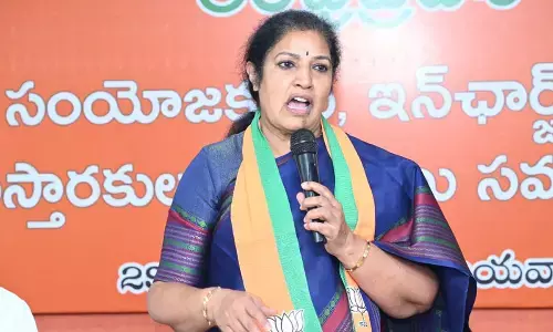 BJP State president Daggubati Purandeswari addressing party leaders in Vijayawada on Monday