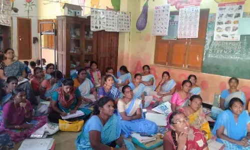 Anganwadi workers at an awareness programme at Model Anganwadi Centre in Kondayapalli on Monday