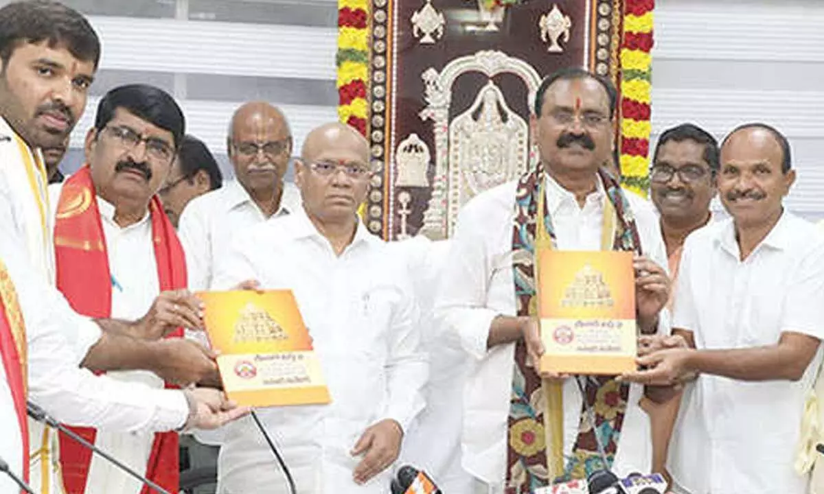 Tirupati Press Club chairman J Bhaskar Reddy and others submitting the fact-finding report to TTD chairman B Karunkar Reddy and EO AV Dharma Reddy in Tirumala on Monday
