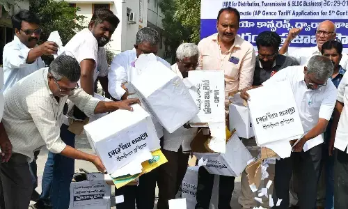 CPM State executive member Ch BabuRao,and party leaders, activist staging a protest on APSPDCL Circle office on Tuesday   Photo: Ch Venkata Mastan