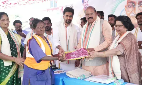 Kasturba Gandhi Kendra Trust chairman Dr P C Rayulu along with Deputy Mayor Bhumana Abhinaya Reddy distributing various items to the needy on the occasion of Mahatma Gandhi’s death anniversary on Tuesday