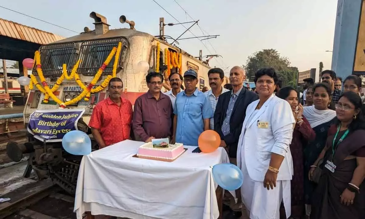 Railway officials celebrating golden jubilee of Godavari Express in Visakhapatnam