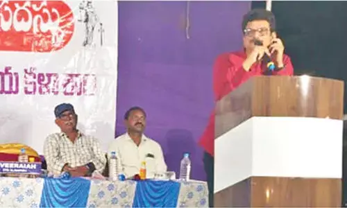 Principal of Indira Priyadarsini Law College in Ongole Dr K Nataraj Kumar speaking at the legal knowledge camp in Ulavapadu on Saturday