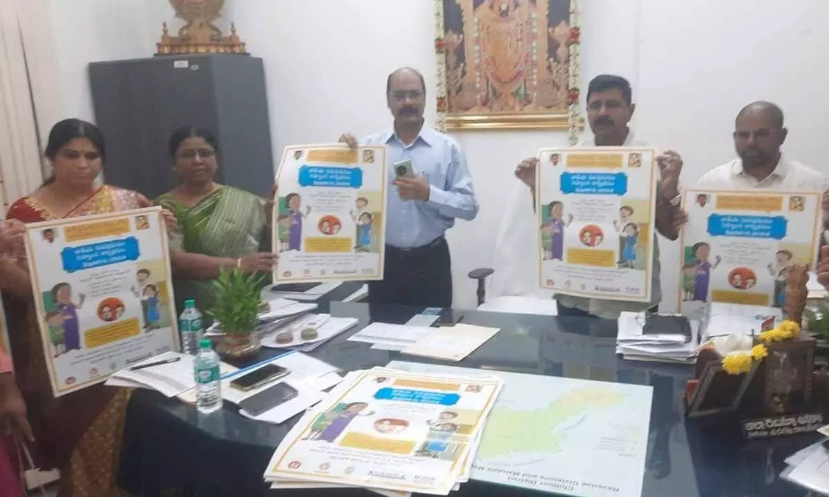 DRO N Rajasekhar along with DM&HO Dr Prabhavati Devi and other officials releasing posters of National Deworming Day in Chittoor on Monday