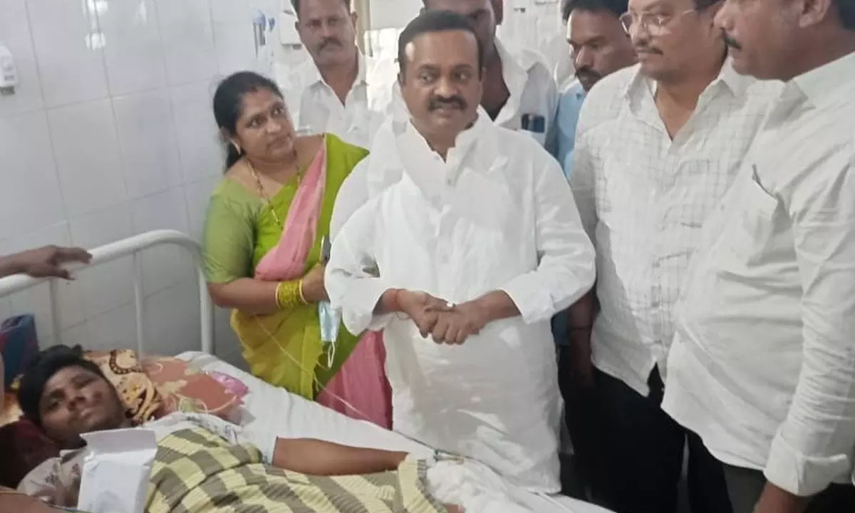 MP V Bala Souri consoling JSP activist undergoing treatment at the GGH-Guntur on Tuesday