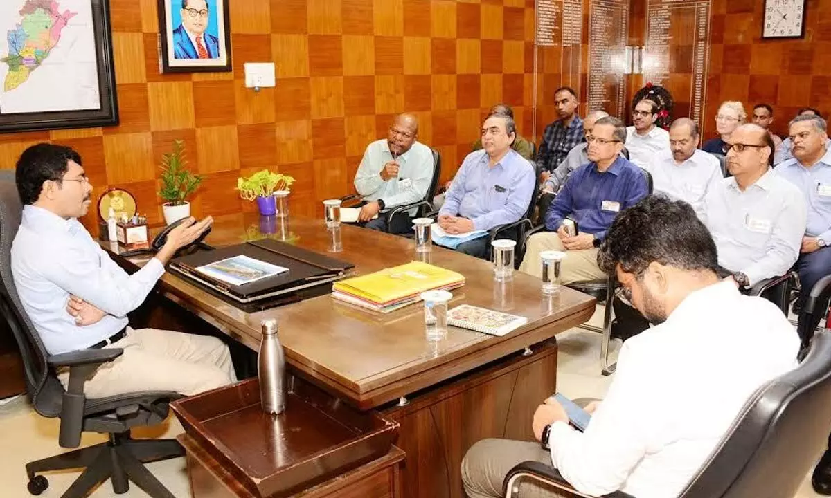 Collector A Mallikarjuna interacting with members of National Defense College in Visakhapatnam on Tuesday