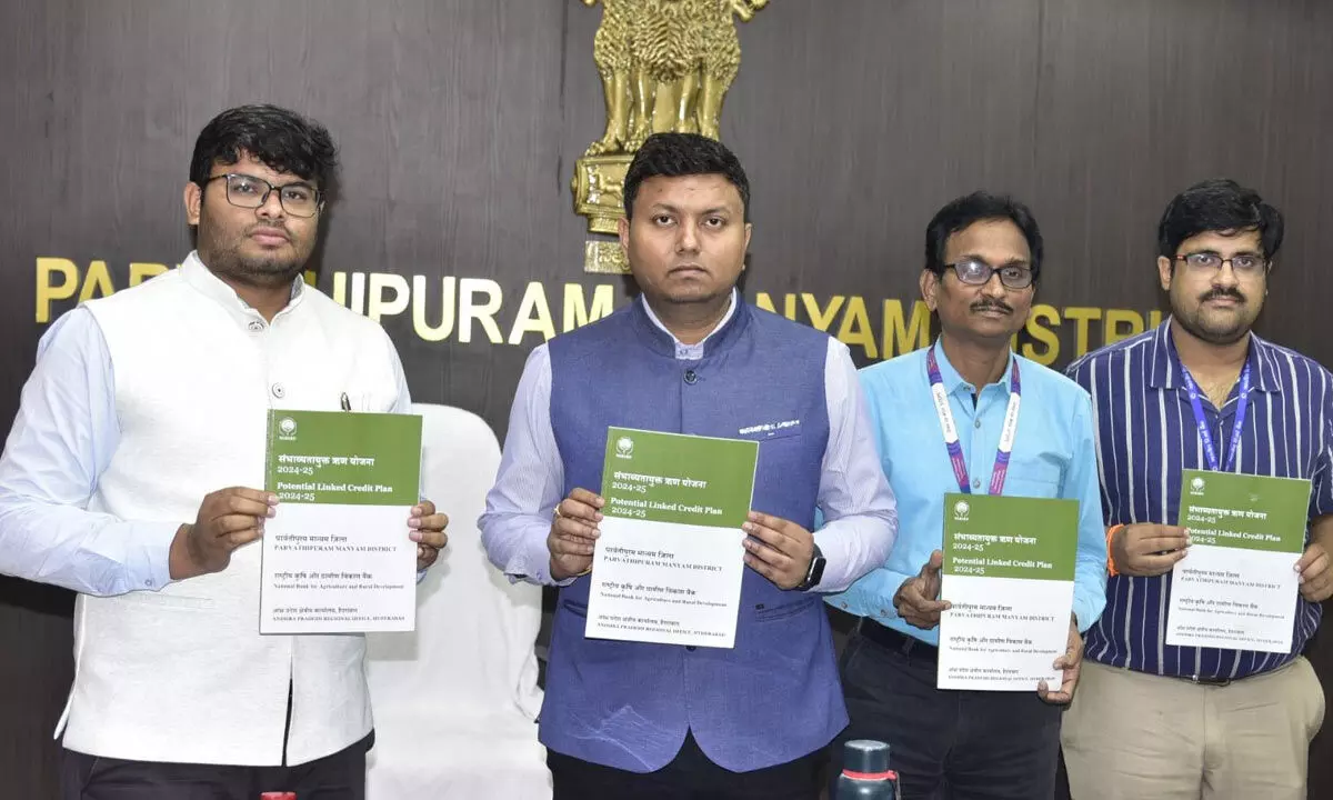 District collector Nishanth Kumar and Nabard officials releasing credit plan in Parvathipuram on Tuesday