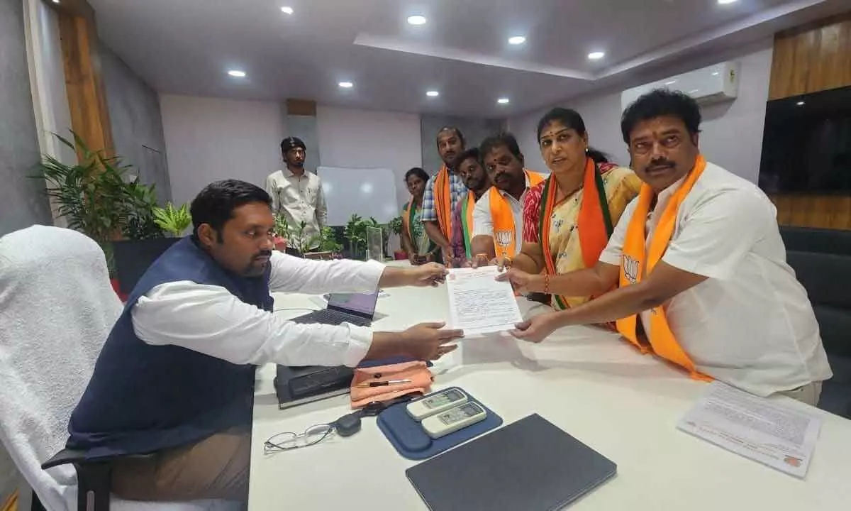 BJP OBC Morcha leaders submitting a petition to joint collector N Tej Bharat in  Rajamahendravaram on Thursday