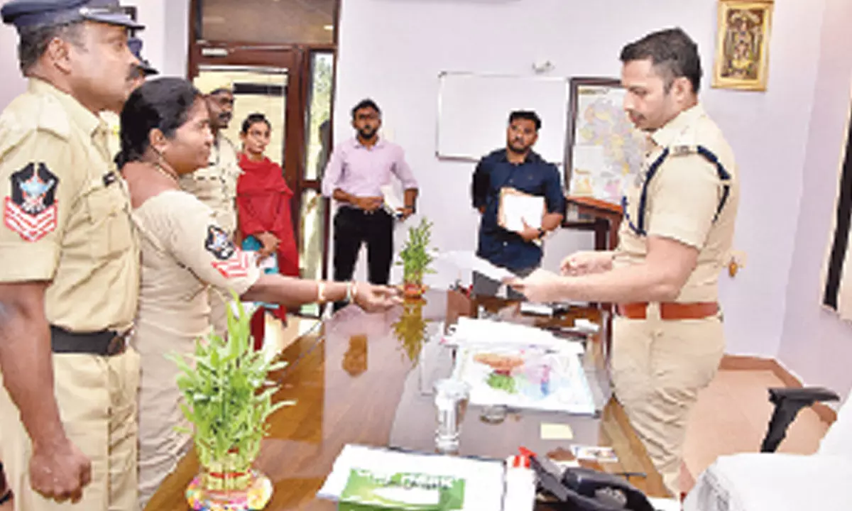District SP Siddharth Kaushal inquiring about the concerns raised by police personnel on Grievance Day in Kadapa on Friday