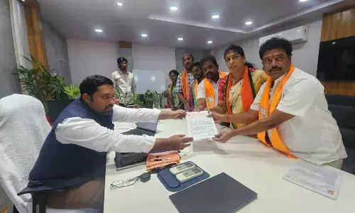 BJP OBC Morcha leaders submitting a petition to joint collector N Tej Bharat in  Rajamahendravaram on Thursday