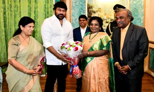 Telangana Governor felicitates Chiranjeevi