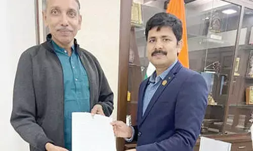 Tirupati MP Dr M Gurumoorthy submitting a letter to UGC Chairman Prof M Jagadesh Kumar in New Delhi on Friday