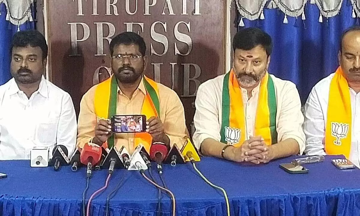 BJP spokesperson Samanchi Srinivas addressing a press conference in Tirupati on Monday.  G Bhanu Prakash Reddy and others are also seen. (Photo:  Vani Mallela)