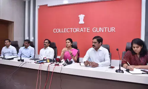 Minister for Medical and Health Vidadala Rajini holding a review meeting in Guntur on Monday. Special Chief Secretary (Medical and Health) M T Krishna Babu, District Collector M Venugopal Reddy and GMC Commissioner Keerthi Chekuri are also seen.