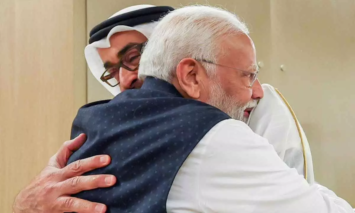 Prime Minister Narendra Modi being received by UAE President Mohamed bin Zayed Al Nahyan upon his arrival in Abu Dhabi on Tuesday