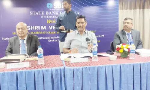 The Chairman of the National Commission for Safai Karmacharis, M Venkatesan, during his visit to Telangana, interacted with the housekeeping staff deployed with SBI on Tuesday at the State Guest House, Begumpet.