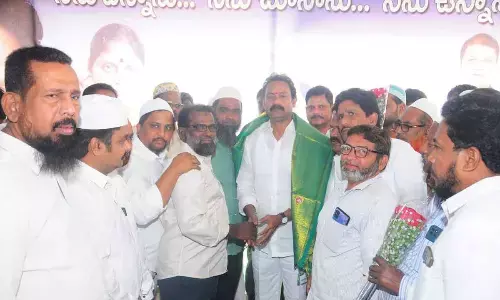 Alla Nani distributes party post order forms to cadre