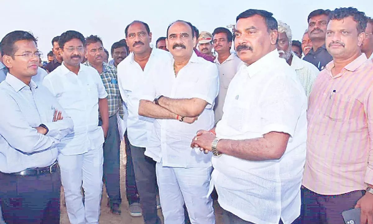 Ministers A Suresh, M Nagarjuna, Ongole MLA Balineni Srinivasa Reddy, MLC Talasila Raghuram and Collector AS Dinesh Kumar inspecting arrangements for CM’s tour at Agraharam in Ongole on Monday