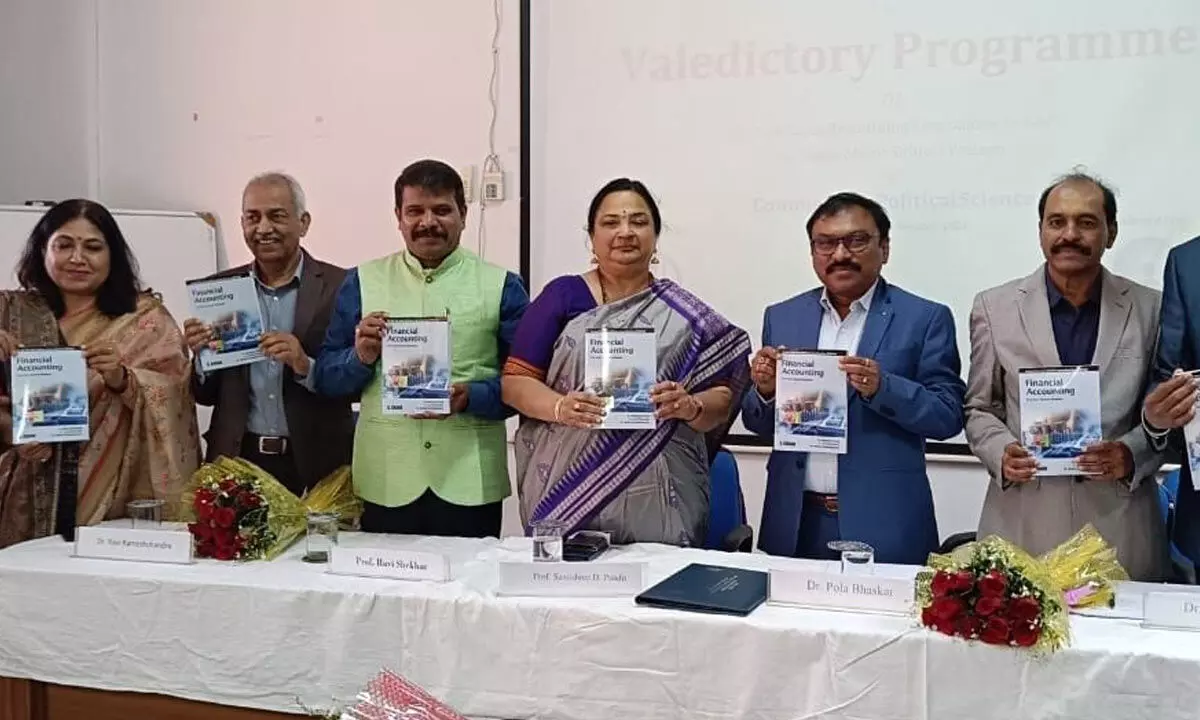 JUN Vice-Chancellor Prof Santhisri Pandit and other dignitaries releasing a book on financial accounting at Government Arts College in Anantapur on Monday