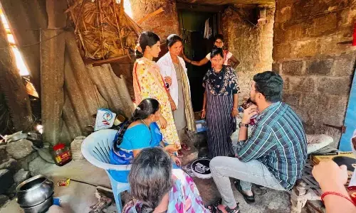 Medical and health staff recording the health details of  pregnant women in Pachipenta mandal