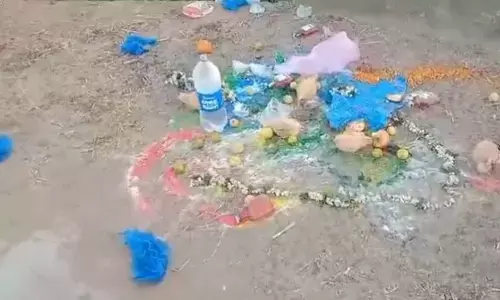 Rangoli designs with turmeric, Kumkum and lemon in front of a graveyard near Reddipalle village on Monday