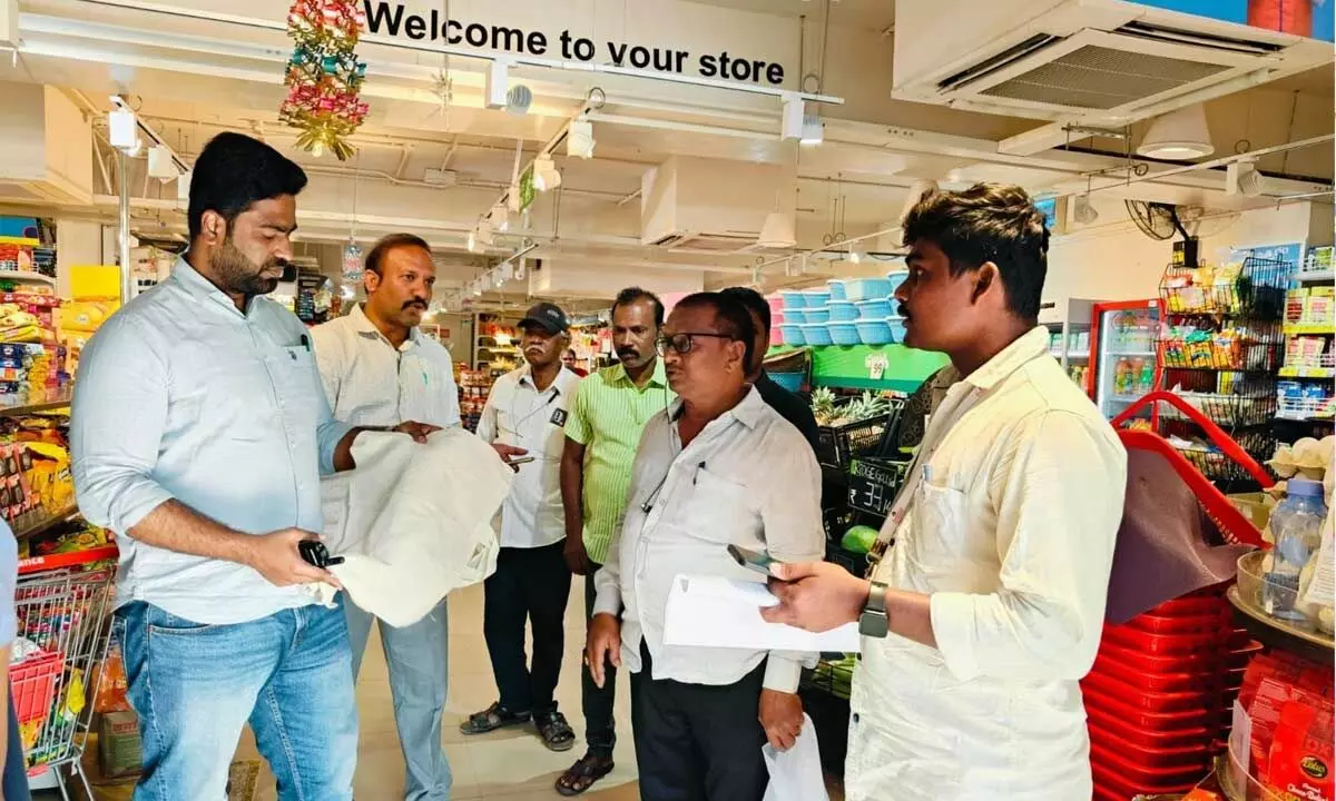 Municipal Corporation health officer Dr Yuva Anvesh Reddy during an inspection at a store in Tirupati on Tuesday