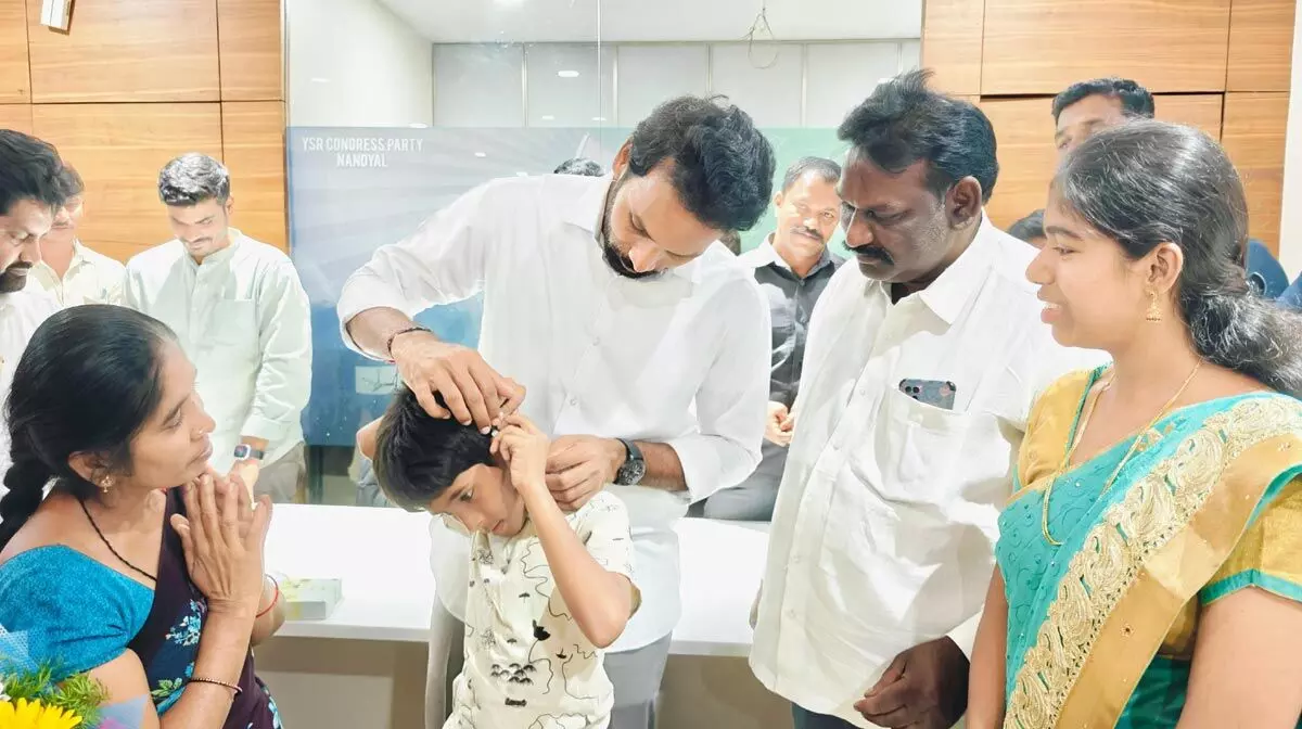 Nandyal MLA Shilpa Ravi Reddy hands and ver hearing aid to deaf and dumb children