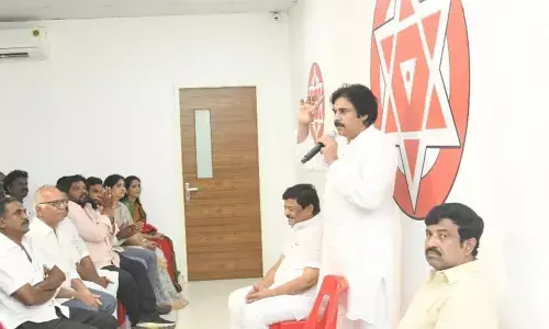 Jana Sena chief Pawan Kalyan speaks to key party leaders  at the party office in Rajamahendravaram on Tuesday