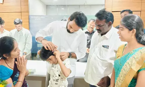 Nandyal MLA Shilpa Ravi Reddy hands and ver hearing aid to deaf and dumb children