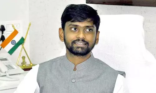 Kadapa Municipal Commissioner G Surya Sai Praveen Chand asks officials the expedite development works