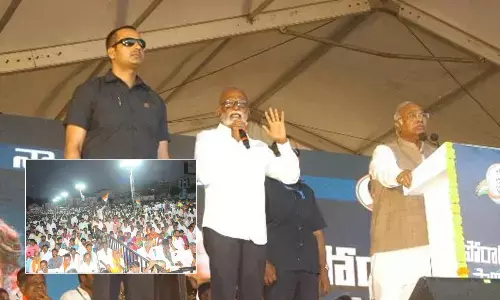 AICC president Mallikarjun Kharge addressing the Congresss Nyaya Sadhana Sabha in Anantapur on Monday. Former minister  N Raghuveera Reddy translating the Kharges speech.