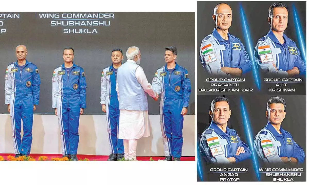 Prime Minister Narendra Modi hands-over wings to astronauts-designate Shubanshu Shukla, Prashanth Balakrishnan Nair, Angad Prathap and Ajit Krishnan who have been selected to be the astronauts on India’s first crewed mission to space Gaganyaan Mission, at the Vikram Sarabhai Space Centre (VSSC), in Thiruvananthapuram on Tuesday