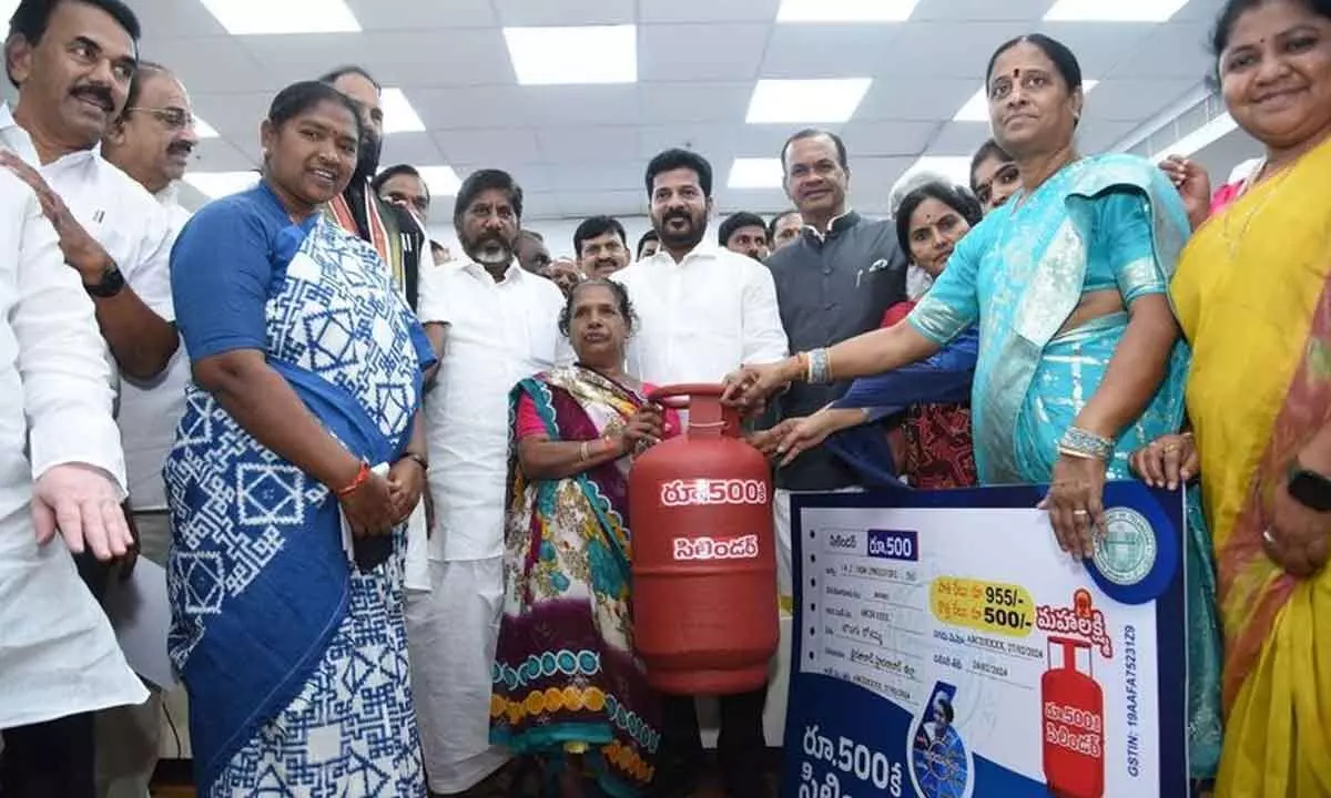 Congress govt launches gas cylinder, free power schemes