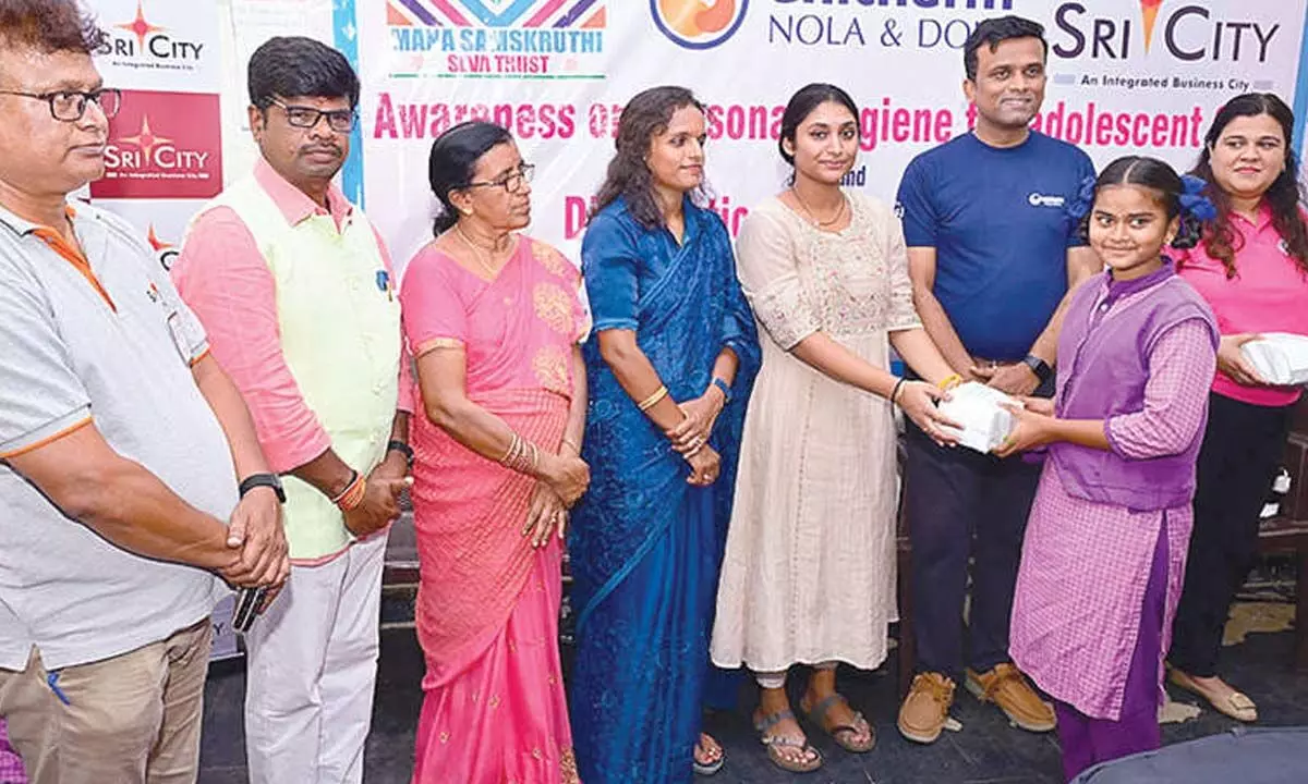 Nireesha Sannareddy with adolescent girls in Sullurupeta  on Tuesday