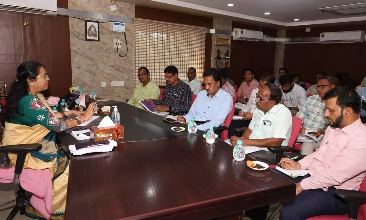 Mayor Gundu Sudharani conducting a a meeting with the GWMC engineering officials in  Warangal on Tuesday