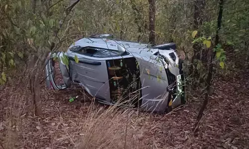 Four injured, three critical after car overturns in Mulugu district