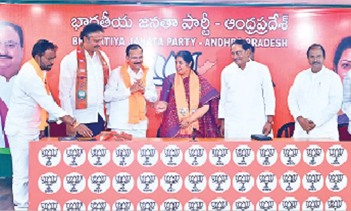 BJP state president D Purandeswari welcomes an industrialist from Rayalaseema Valligatla Reddapa into party at state office in Vijayawada on Saturday