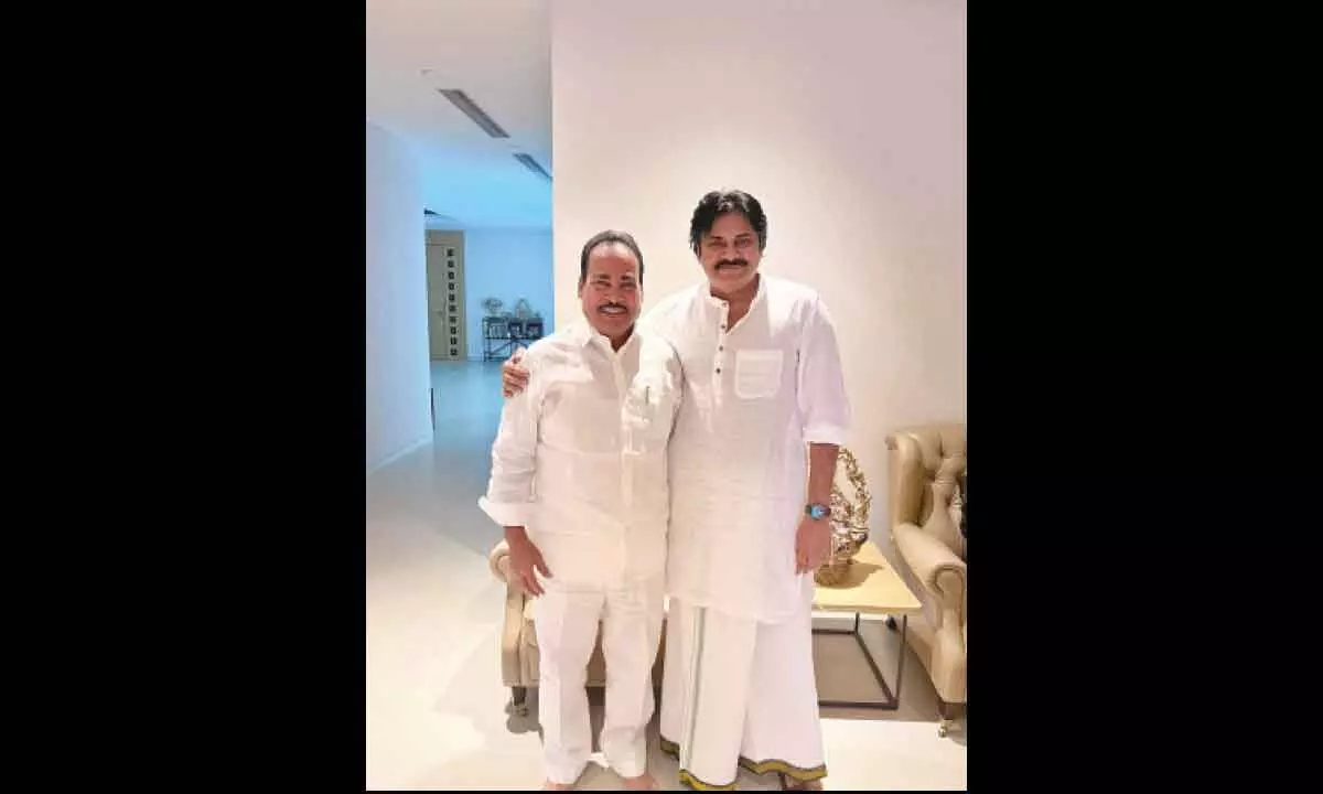 Chittoor YSRCP MLA Jangalapalli Srinivasulu with Jana Sena Party chief Pawan Kalyan in Hyderabad on Sunday