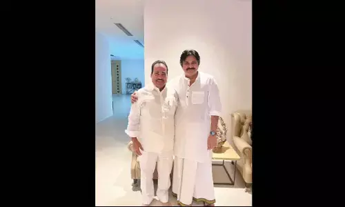 Chittoor YSRCP MLA Jangalapalli Srinivasulu with Jana Sena Party chief Pawan Kalyan in Hyderabad on Sunday