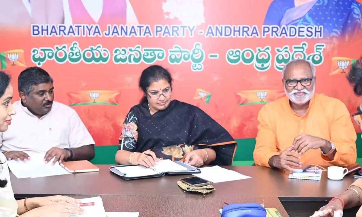 BJP state president Daggubati Purandeswari and other leaders attend the election manifesto committee meeting at state party office in Vijayawada on Monday