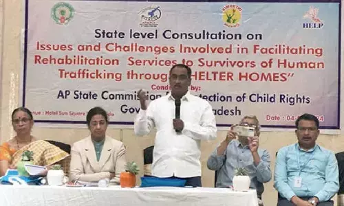 Dr Kesali Apparao, chairman of AP State Commission for Protection of Child Rights, addressing a workshop on ‘Rehabilitation of trafficking survivors’ in Vijayawada on Monday. KGV Sarita, SP (CID), Sailaja, Joint Director of Women Development and Child Welfare, Tirupathi Rao, State coordinator of Bachpan Bachao Andolan, and others are  also seen