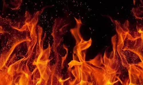 Fire erupts from a stationary goods train in Kazipet Railway station, no casualties