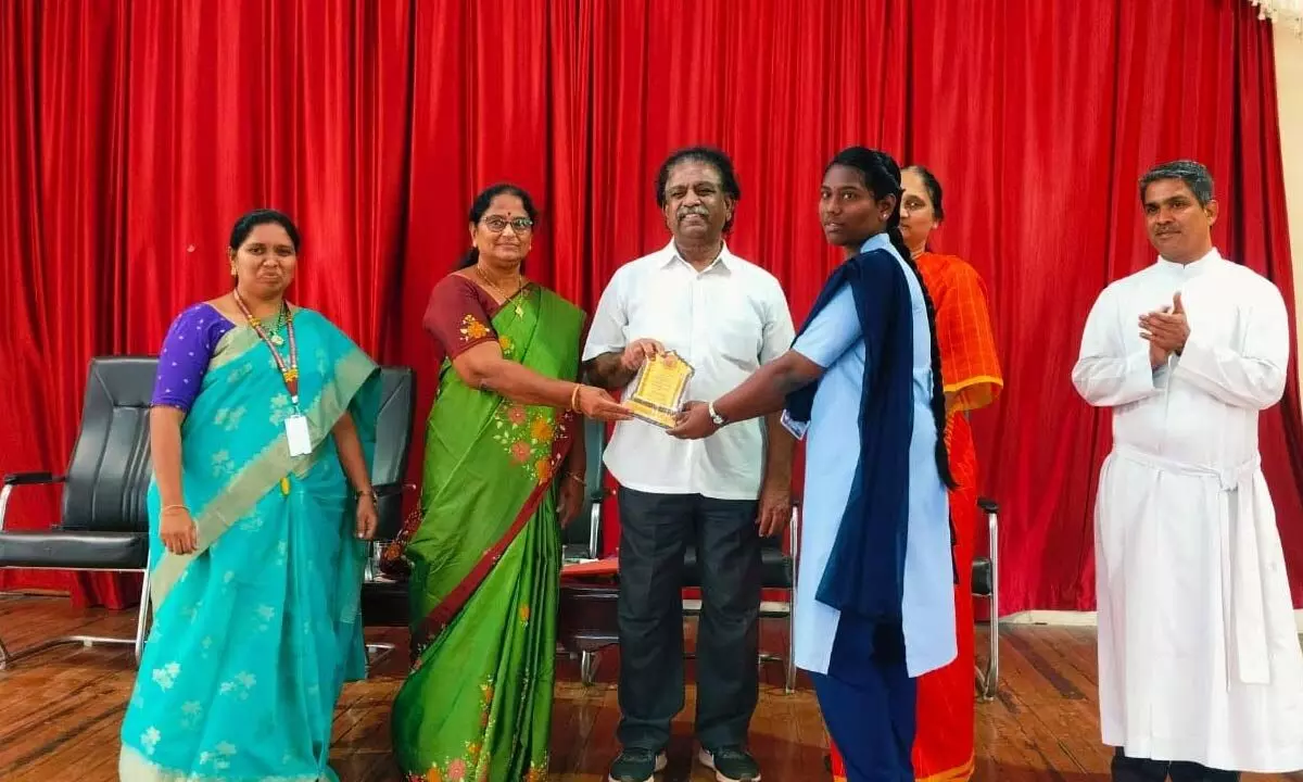 MLC KS Lakshmana Rao and SAFE president G Jyotsna presenting prizes to winners at Andhra Loyola Institute of Engineering and Technology on Tuesday