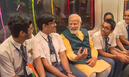 PM rides underwater metro with children