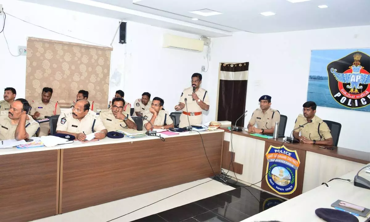 East Godavari District SP P Jagadeesh holding a review meeting with officers in Rajamahendravaram on Monday