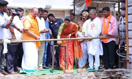 Minister for medical and health VidadalaRajini performing bhumi puja for the reconstruction of Golla Anjaneya Swamy temple at Sangadigunta in Guntur city on Monday