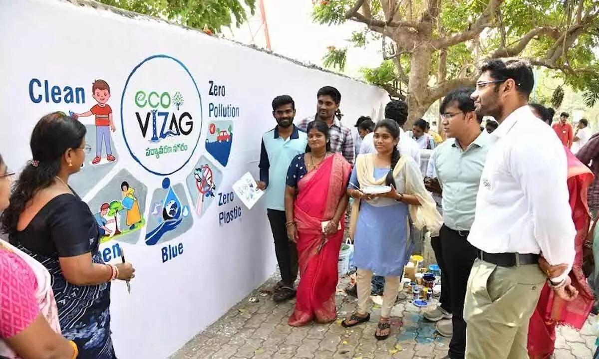GVMC Additional Commissioner KS Viswanathan examining ‘paint my street challenge’ carried out near Siripuram junction in Visakhapatnam on Tuesday