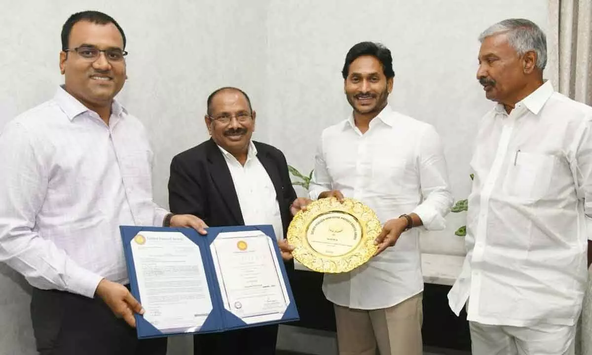 Traansco officials with CM Y S Jagan Mohan Reddy, energy minister Peddireddi Ramachandra Reddy at CM camp office in Tadepalli on Tuesday